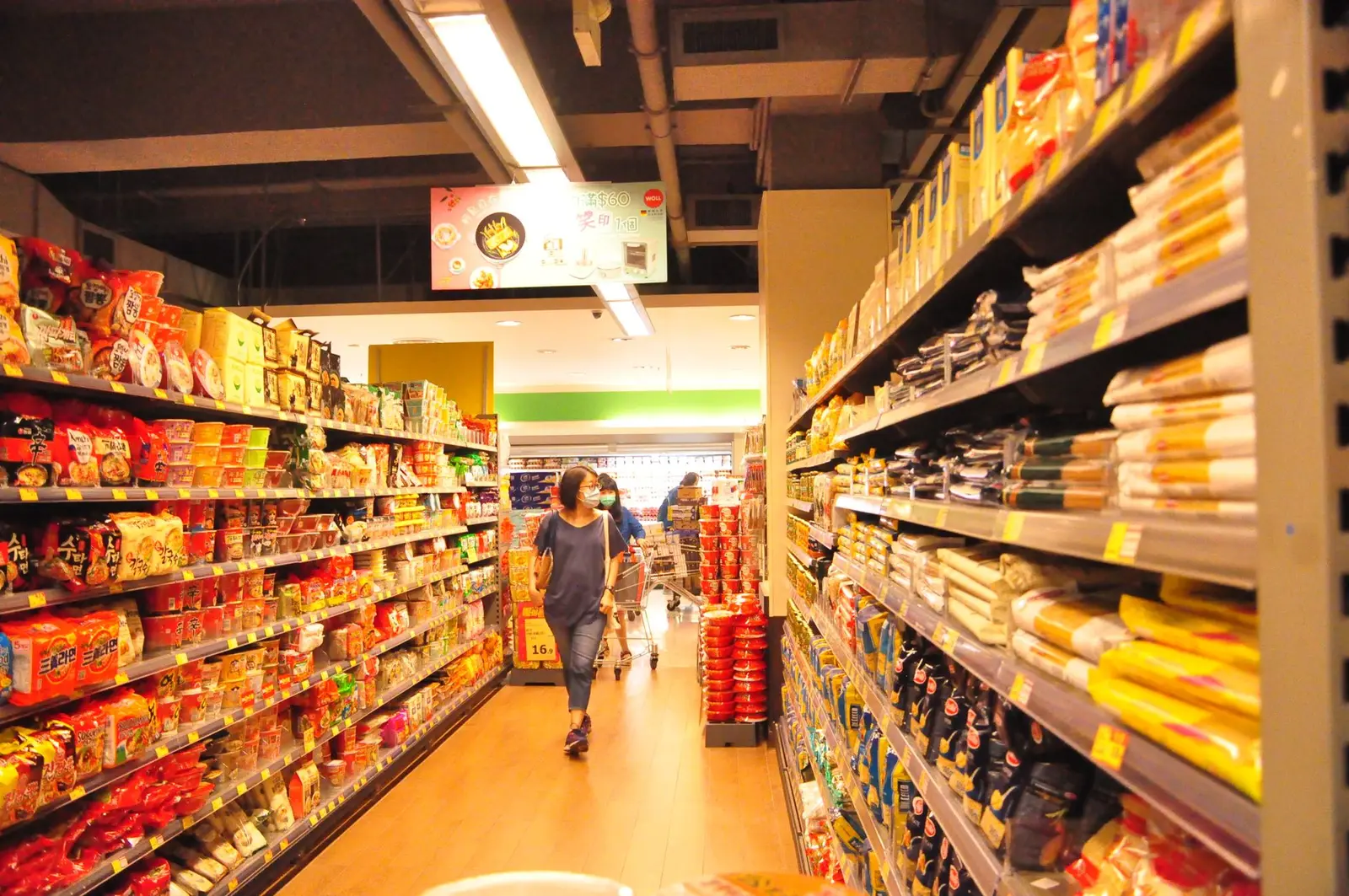 An empty supermarket shelf with an Italian gnocchi box symbolizing scarcity.